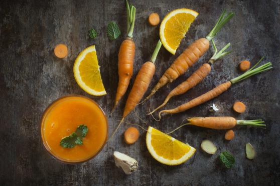 Fresh orange, ginger, and carrot juice